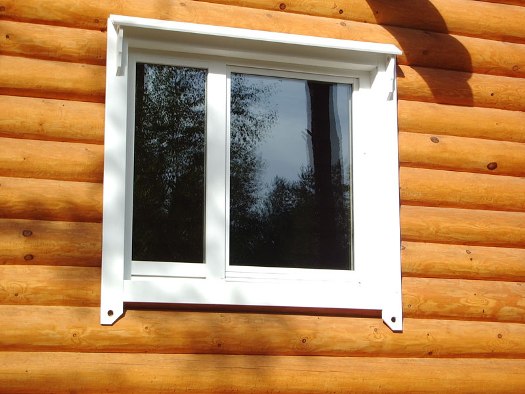 Пластиковые окна для деревянного дом